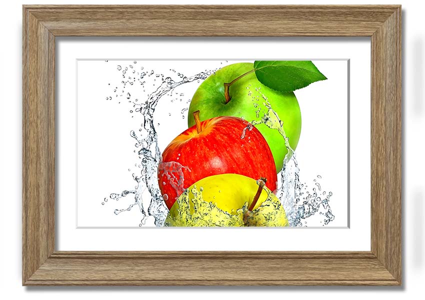 Framed print of apples splashing in water, showcasing vibrant colors and dynamic design, ready to hang.