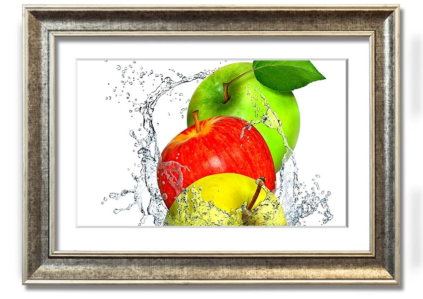 Framed print of apples splashing in water, showcasing vibrant colors and dynamic design, ready to hang.