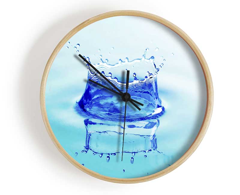 Aqua Splash clock made from natural bamboo with a round face, available in black, white, and natural frame colors.