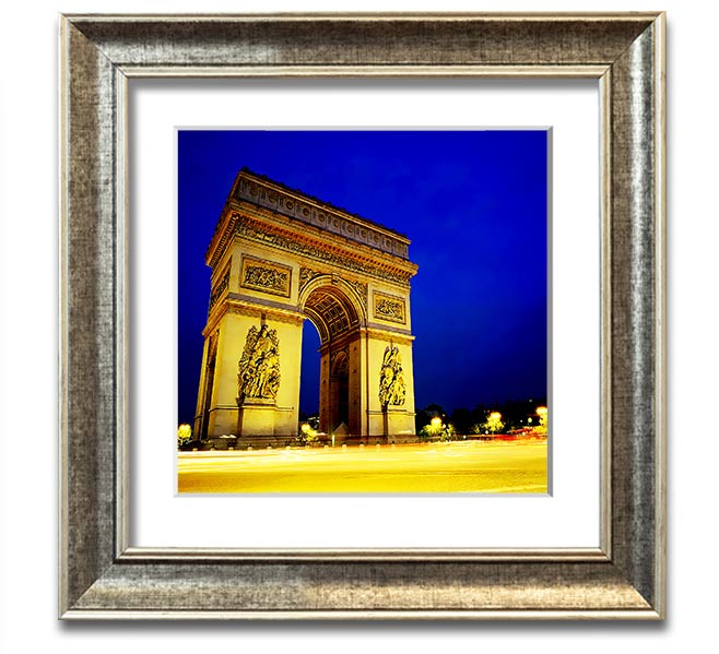 A beautifully framed print of the Arc De Triomphe, showcasing intricate details and vibrant colors, ready to hang.