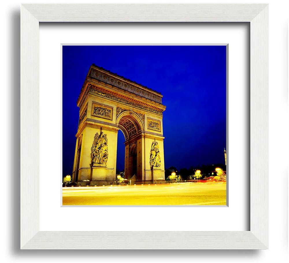 A beautifully framed print of the Arc De Triomphe, showcasing intricate details and vibrant colors, ready to hang.