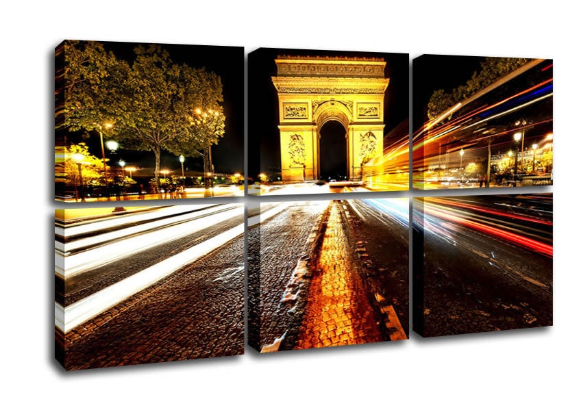 A beautiful canvas print of the Arc De Triomphe illuminated at night, showcasing its grandeur and architectural details.