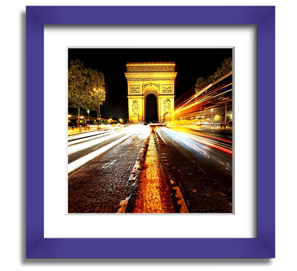 A beautifully framed print of the Arc De Triomphe illuminated at night, showcasing its architectural details and vibrant colors.