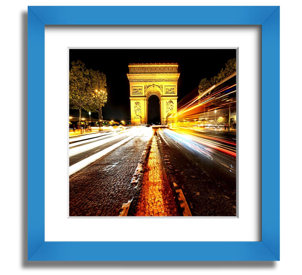 A beautifully framed print of the Arc De Triomphe illuminated at night, showcasing its architectural details and vibrant colors.