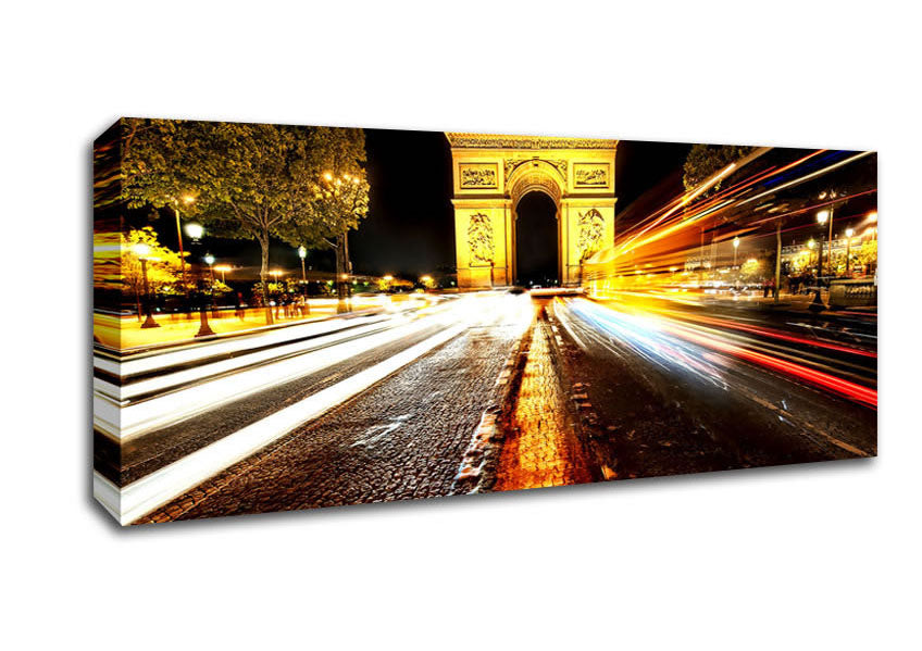 Canvas print of the Arc De Triomphe illuminated at night, showcasing its architectural details and vibrant colors.