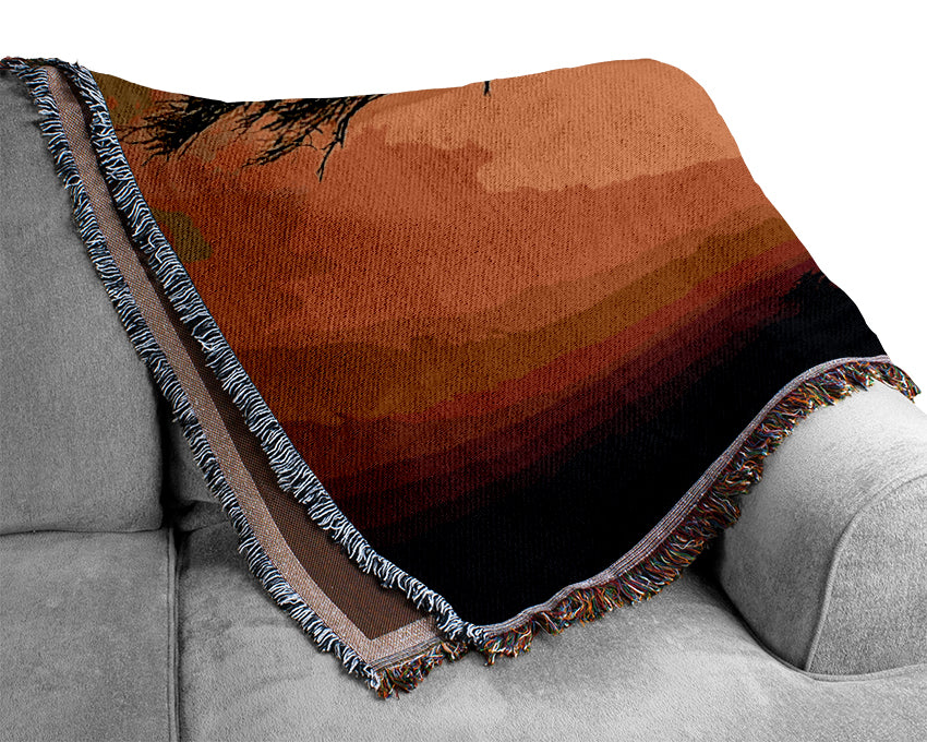 Arcania Tree Sunblaze throw blanket made from 100% cotton, featuring a thermal weave for breathability and a luxurious finish, perfect for home decor.