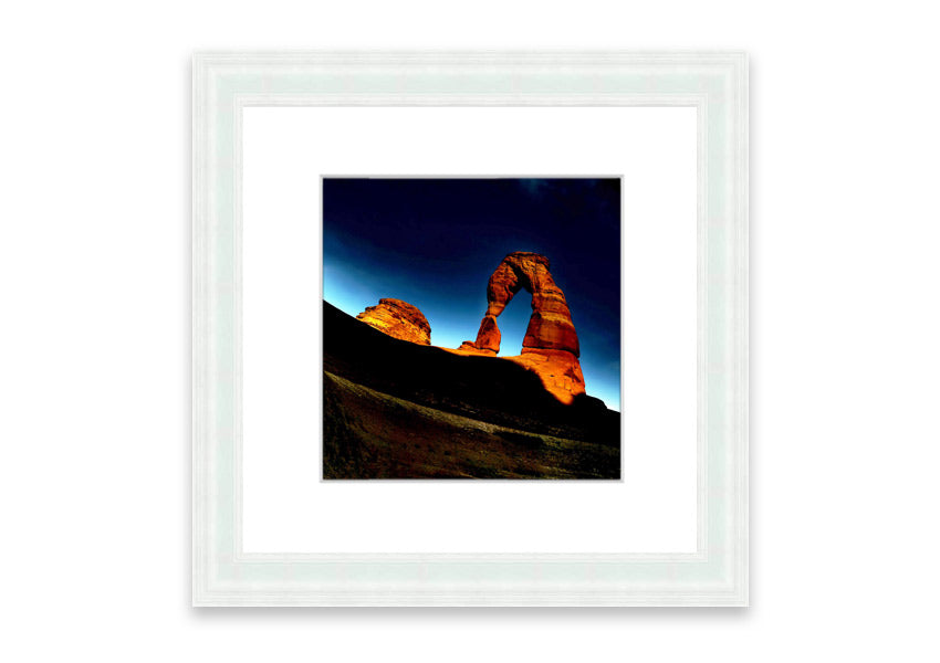 Framed print of Arch Rock Night, showcasing a stunning night sky over Cornwall's iconic rock formation.