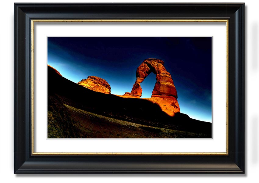 Framed print of Arch Rock at night, showcasing a starry sky and natural beauty, available in various frame colors.