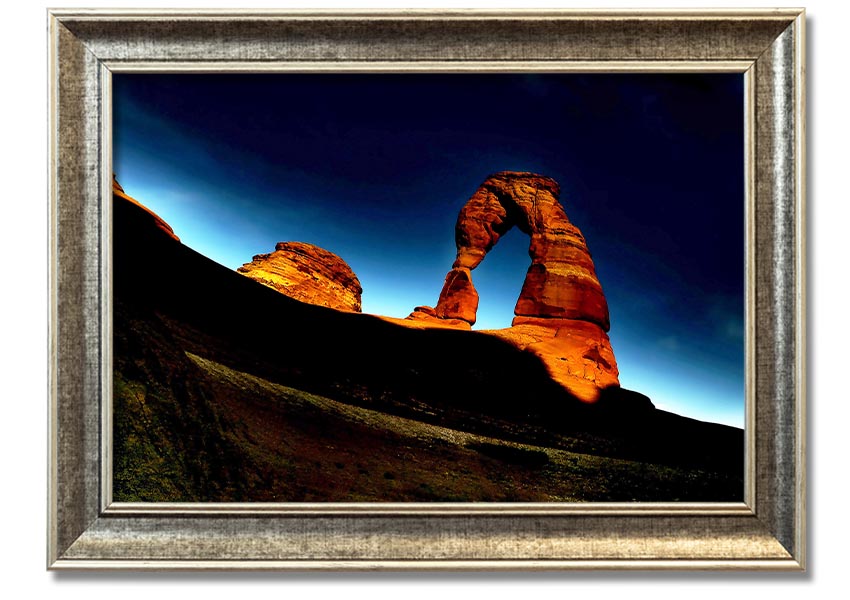 Framed print of Arch Rock at night, showcasing a starry sky and natural beauty, available in various frame colors.