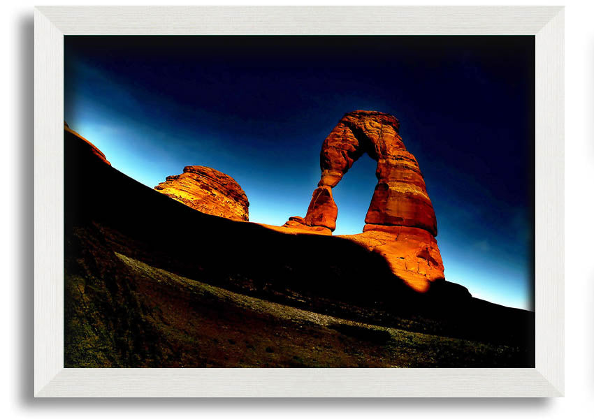 Framed print of Arch Rock at night, showcasing a starry sky and natural beauty, available in various frame colors.