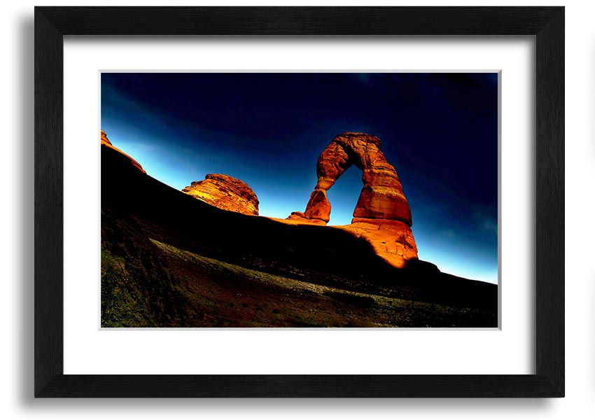 Framed print of Arch Rock at night, showcasing a starry sky and natural beauty, available in various frame colors.