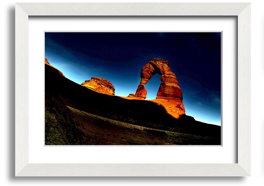 Framed print of Arch Rock at night, showcasing a starry sky and natural beauty, available in various frame colors.