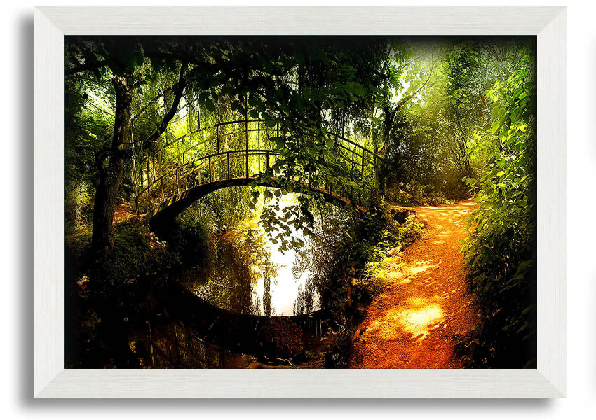 Framed print of an arched bridge reflecting in water, showcasing serene colors and intricate details.