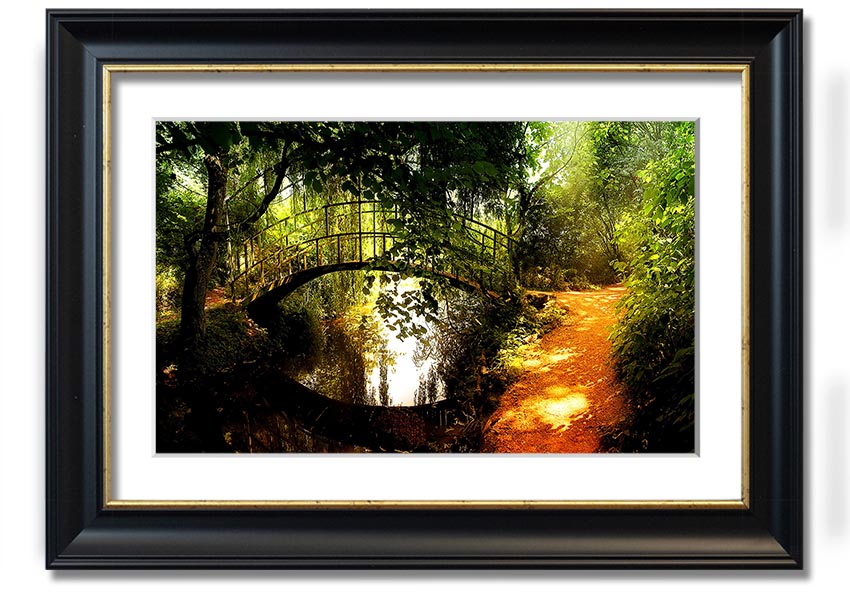 Framed print of an arched bridge reflecting in water, showcasing serene colors and intricate details.