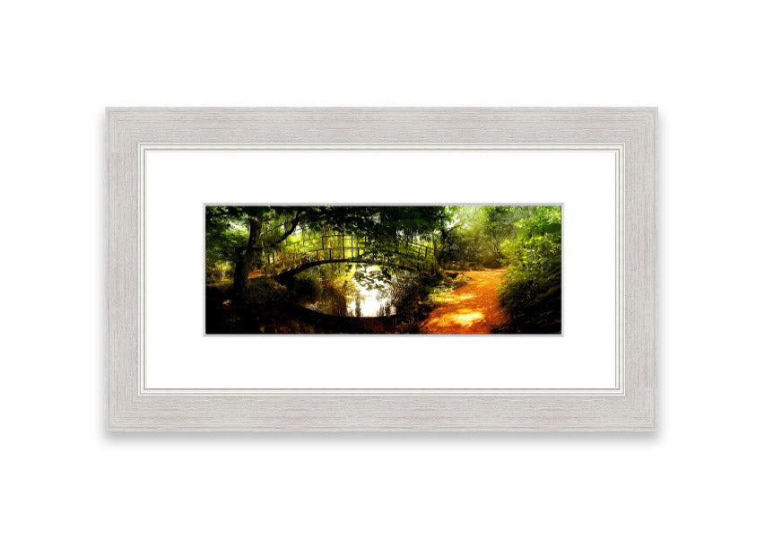 Framed print of Arched Bridge Reflections showcasing serene water and bridge details.