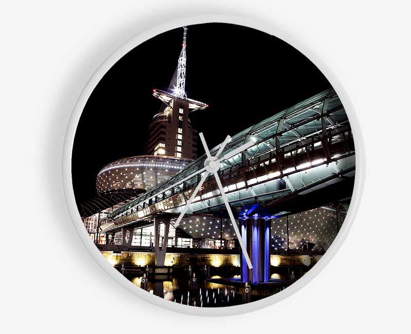 Architects Walkway clock made from natural bamboo with a round face and clear Plexiglas lens, available in black, white, and natural frame colors.