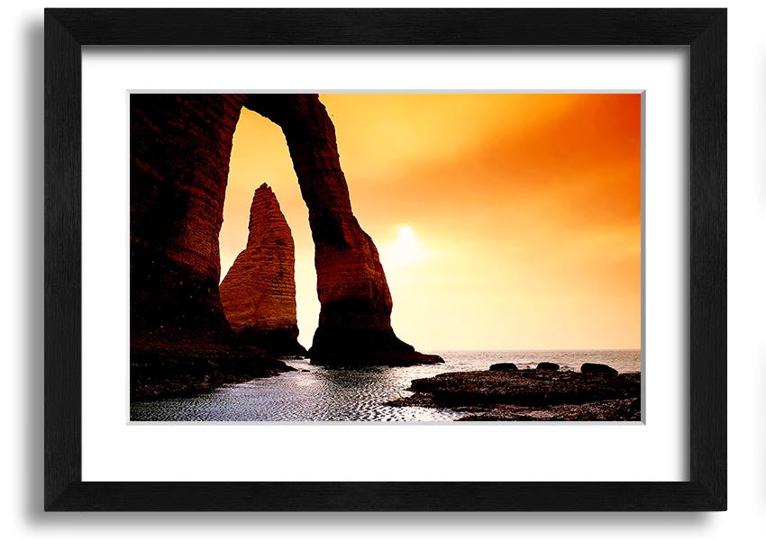 A beautifully framed print of an ocean landscape, showcasing serene blue waters and a calming atmosphere, available in various frame colors.