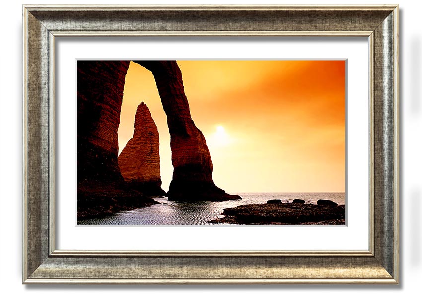 A beautifully framed print of an ocean landscape, showcasing serene blue waters and a calming atmosphere, available in various frame colors.