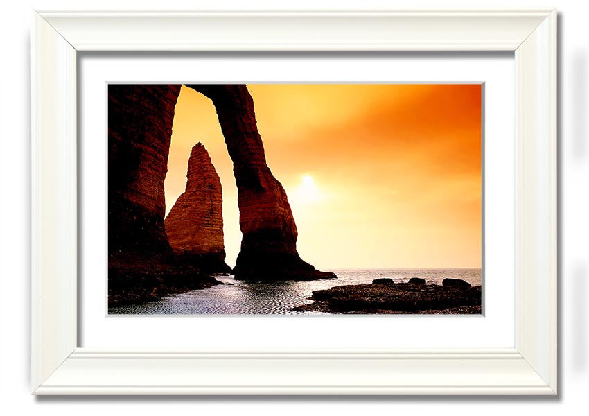 A beautifully framed print of an ocean landscape, showcasing serene blue waters and a calming atmosphere, available in various frame colors.