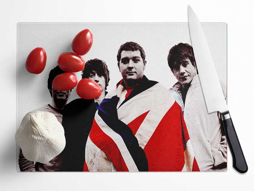 Arctic Monkeys British Flag chopping board made of tempered glass with a chinchilla ripple effect and anti-slip feet.