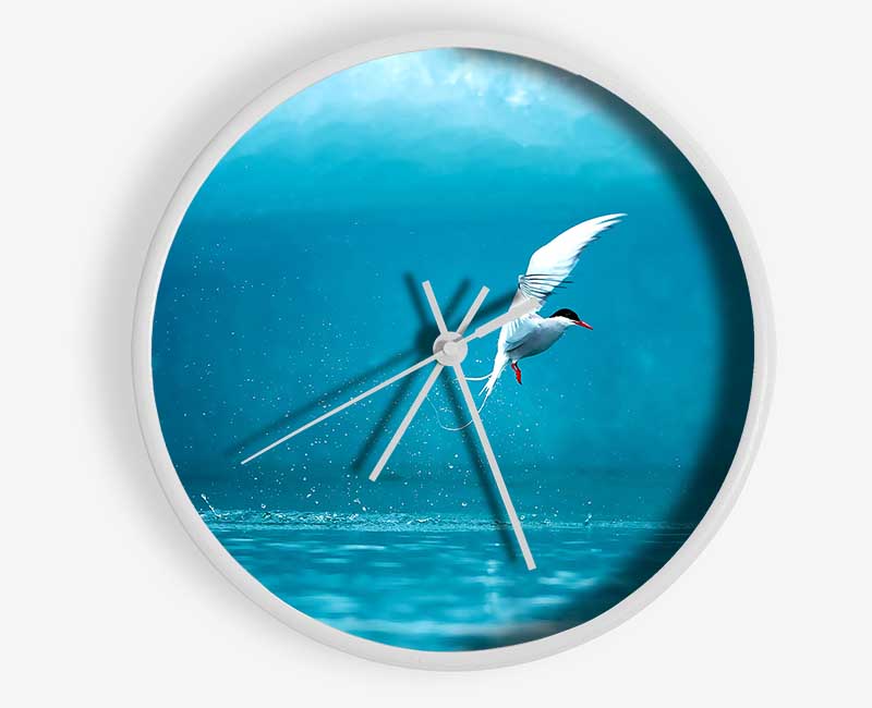 Arctic Tern bamboo clock with a round face, available in black, white, and natural frame colors, featuring a clear Plexiglas lens.