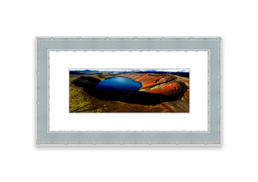 Framed print of Arctic Volcanic Lake, showcasing vibrant colors and intricate details, available in various frame colors.