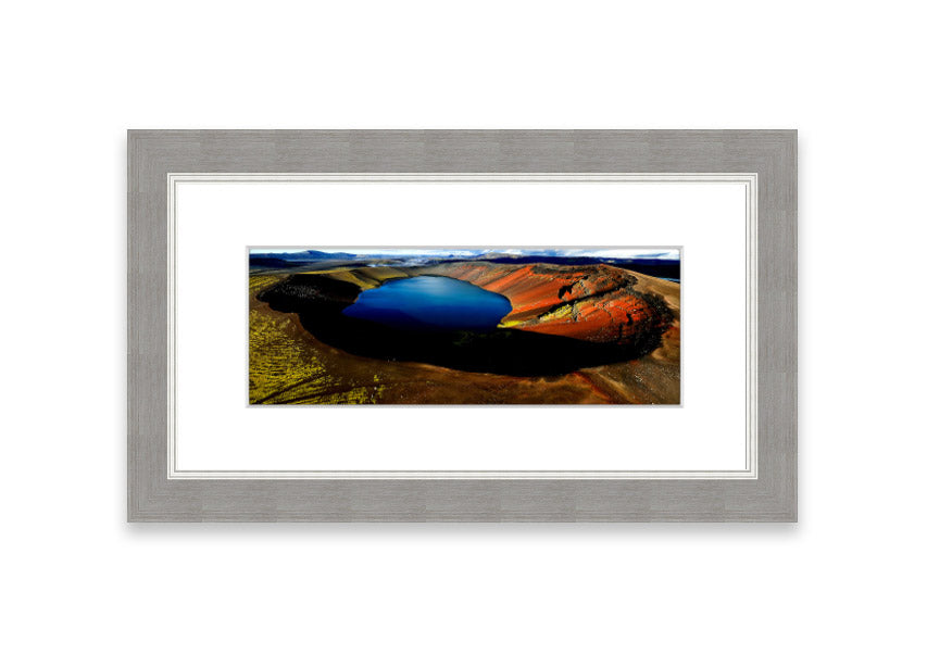 Framed print of Arctic Volcanic Lake, showcasing vibrant colors and intricate details, available in various frame colors.