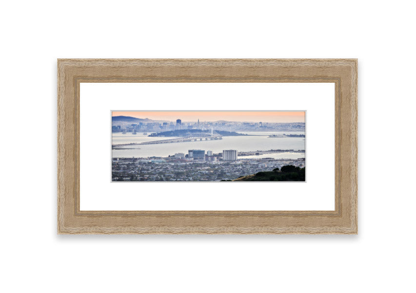 A framed print showcasing an aerial view of a vibrant city, beautifully presented in a stylish frame.