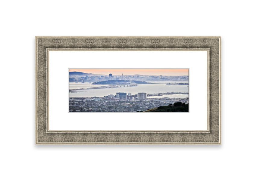 A framed print showcasing an aerial view of a vibrant city, beautifully presented in a stylish frame.