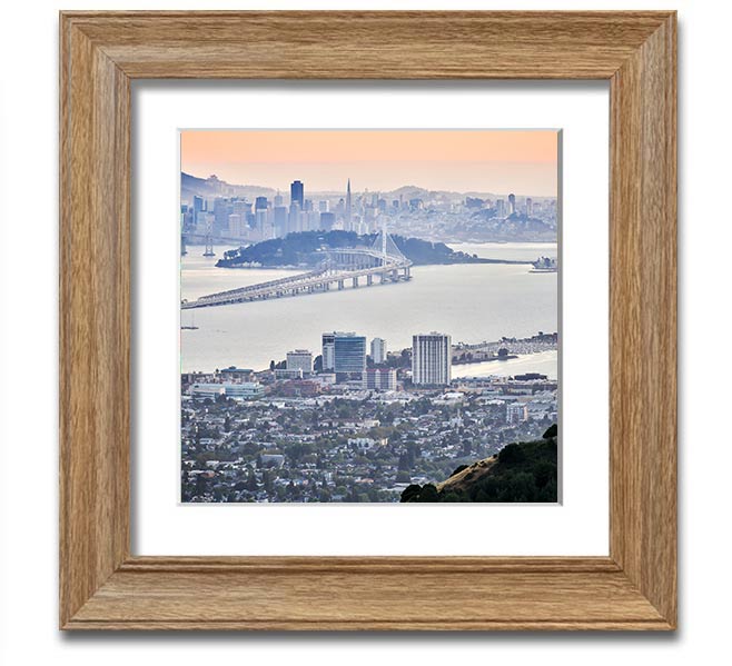 Aerial view of a vibrant city square framed print, showcasing intricate details and colors, ready to hang.