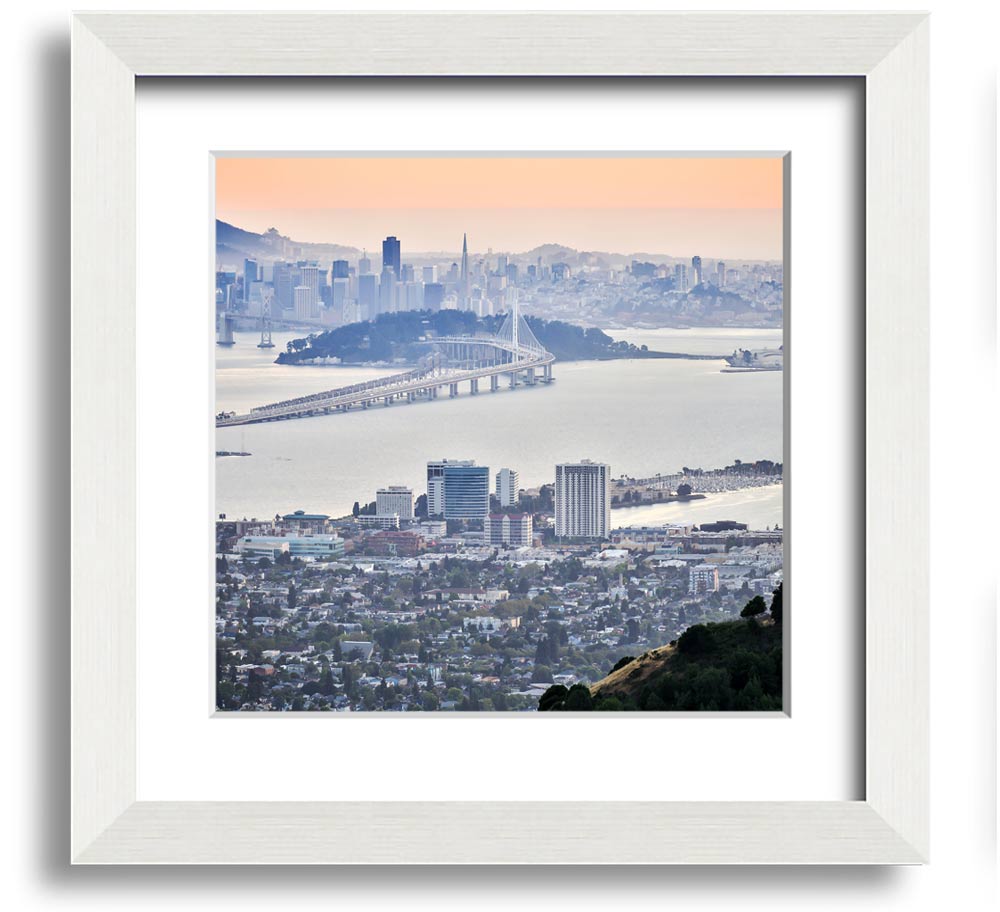 Aerial view of a vibrant city square framed print, showcasing intricate details and colors, ready to hang.