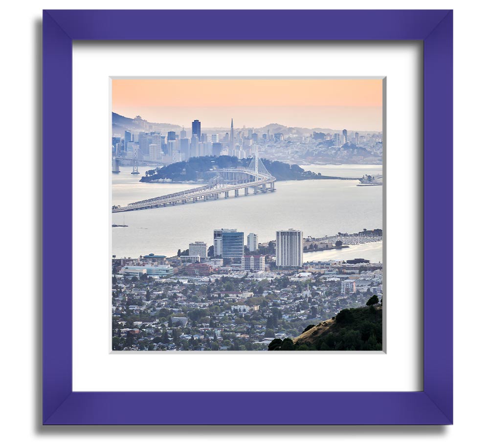 Aerial view of a vibrant city square framed print, showcasing intricate details and colors, ready to hang.