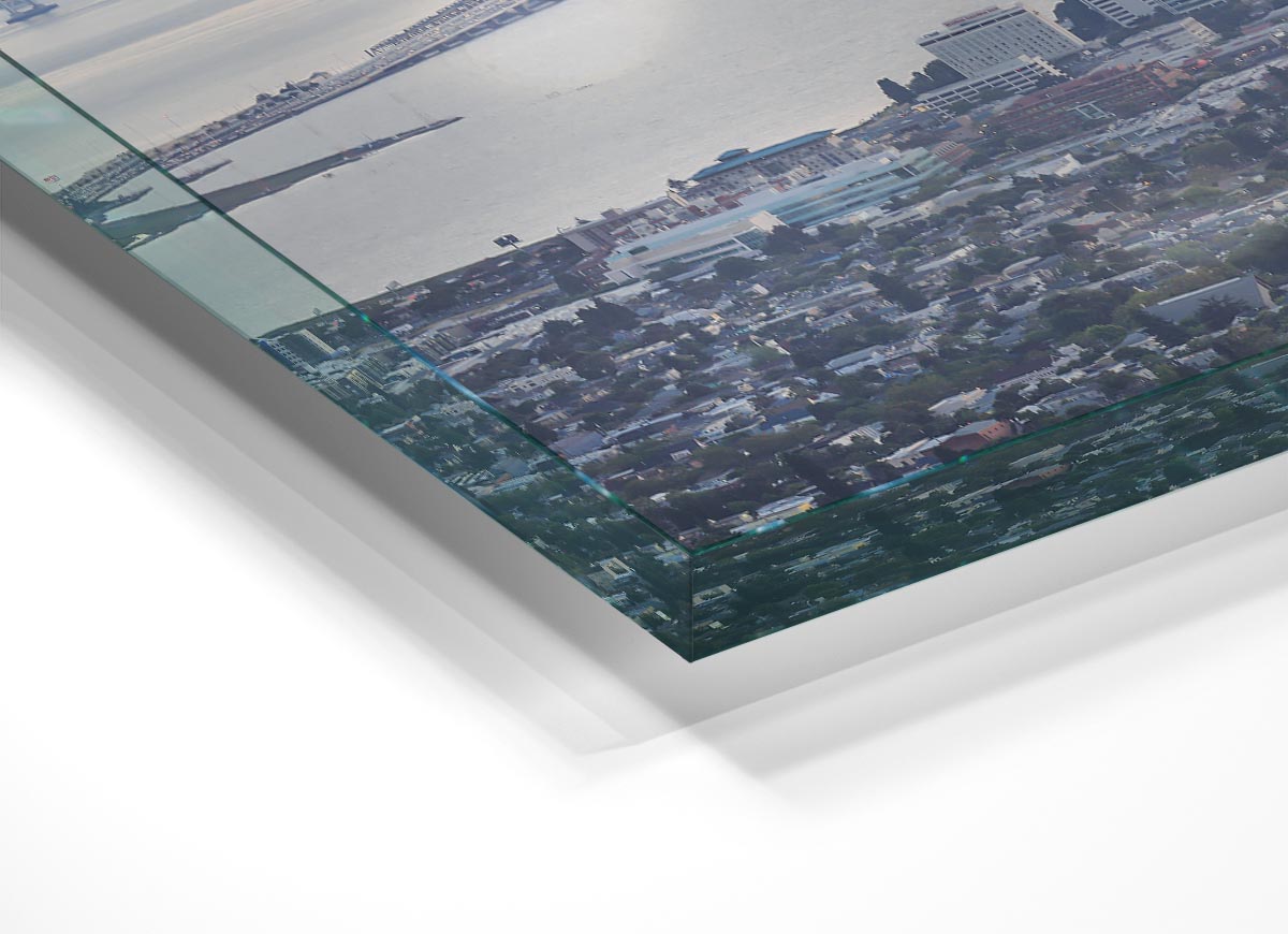 A stunning glass print featuring an aerial view of a vibrant city skyline, showcasing intricate details and modern design.