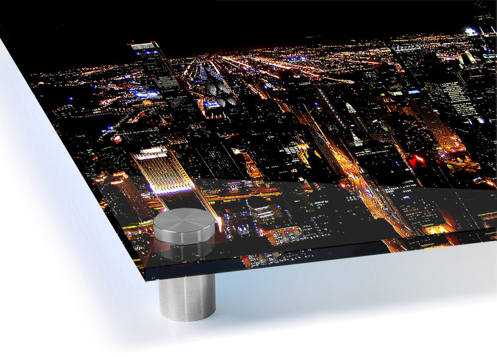 Acrylic print of a vibrant night cityscape, showcasing illuminated buildings and streets, perfect for wall decor.