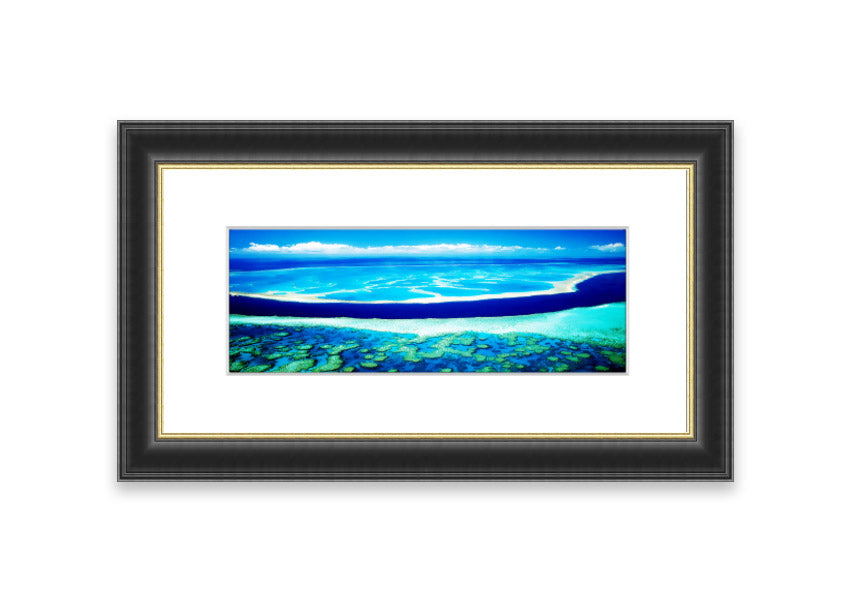 A framed print showcasing an aerial view of a turquoise ocean, beautifully capturing the vibrant colors and serene waves.