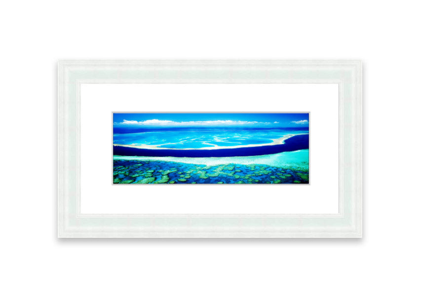 A framed print showcasing an aerial view of a turquoise ocean, beautifully capturing the vibrant colors and serene waves.