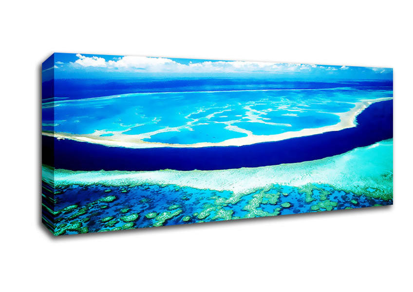 A beautiful canvas print of an aerial view of a turquoise ocean, mounted on a sturdy box frame, ready to hang.