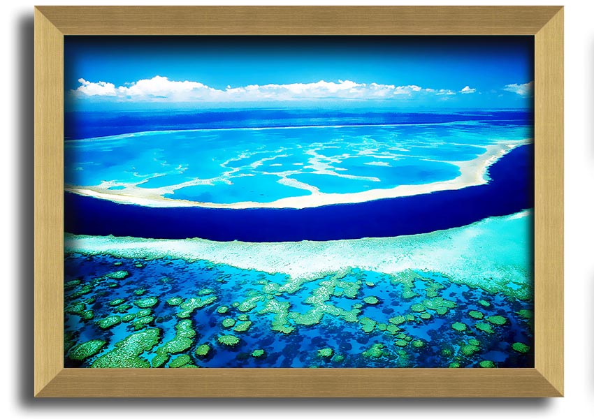 A framed print showcasing an aerial view of a turquoise ocean, highlighting vibrant blue waters and intricate patterns.