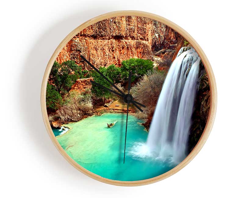 Arizona Waterfalls clock made of natural bamboo with a round face and clear Plexiglas lens, available in black, white, and natural frame colors.