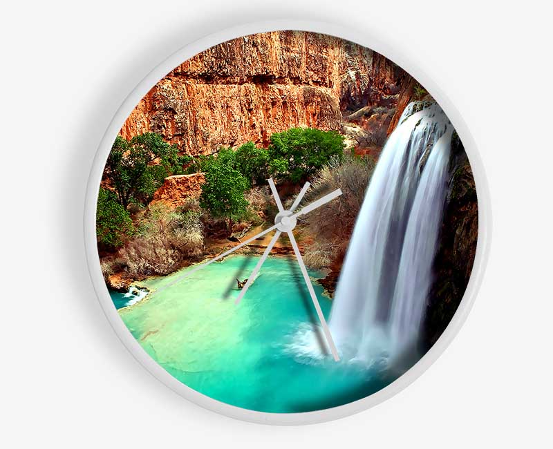 Arizona Waterfalls clock made of natural bamboo with a round face and clear Plexiglas lens, available in black, white, and natural frame colors.