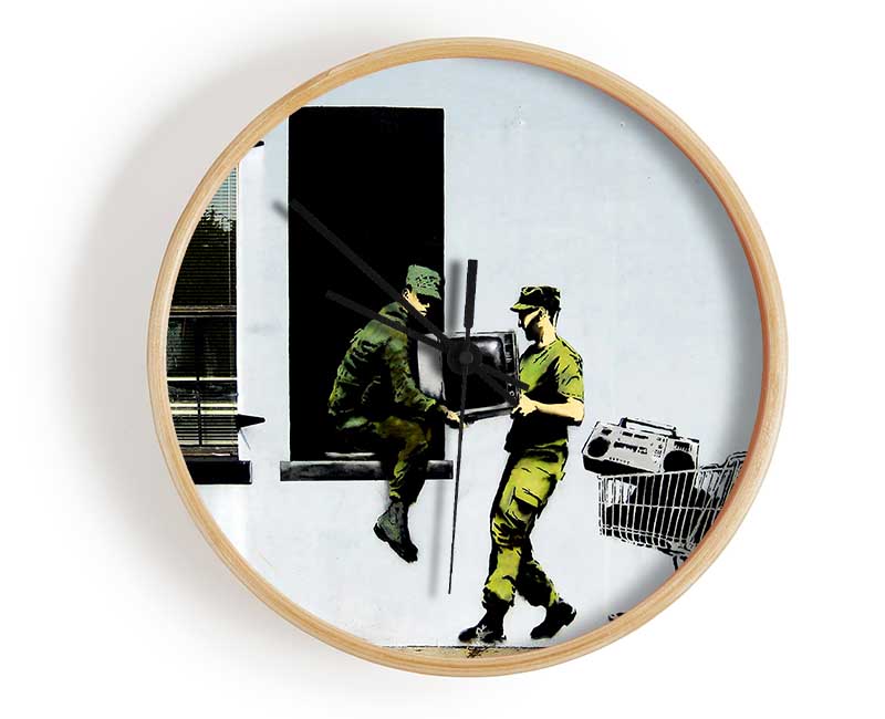 Stylish Army Heist clock made from natural bamboo with a round face and clear Plexiglas lens, available in black, white, and natural frame colors.