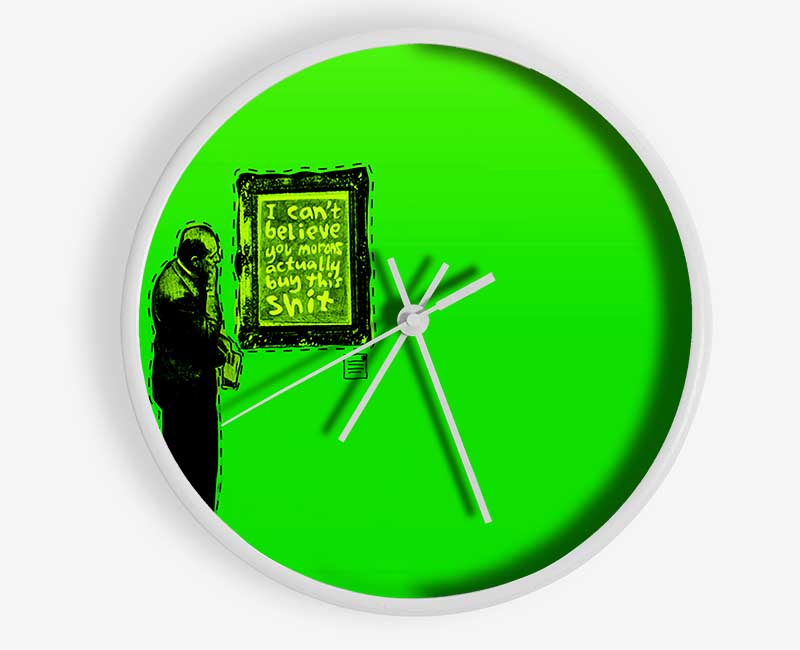 Art Auction Green clock made from natural bamboo with a round face and clear Plexiglas lens, available in black, white, and natural frame colors.