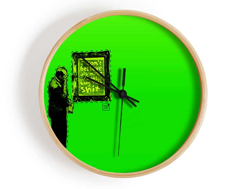 Art Auction Green clock made from natural bamboo with a round face and clear Plexiglas lens, available in black, white, and natural frame colors.