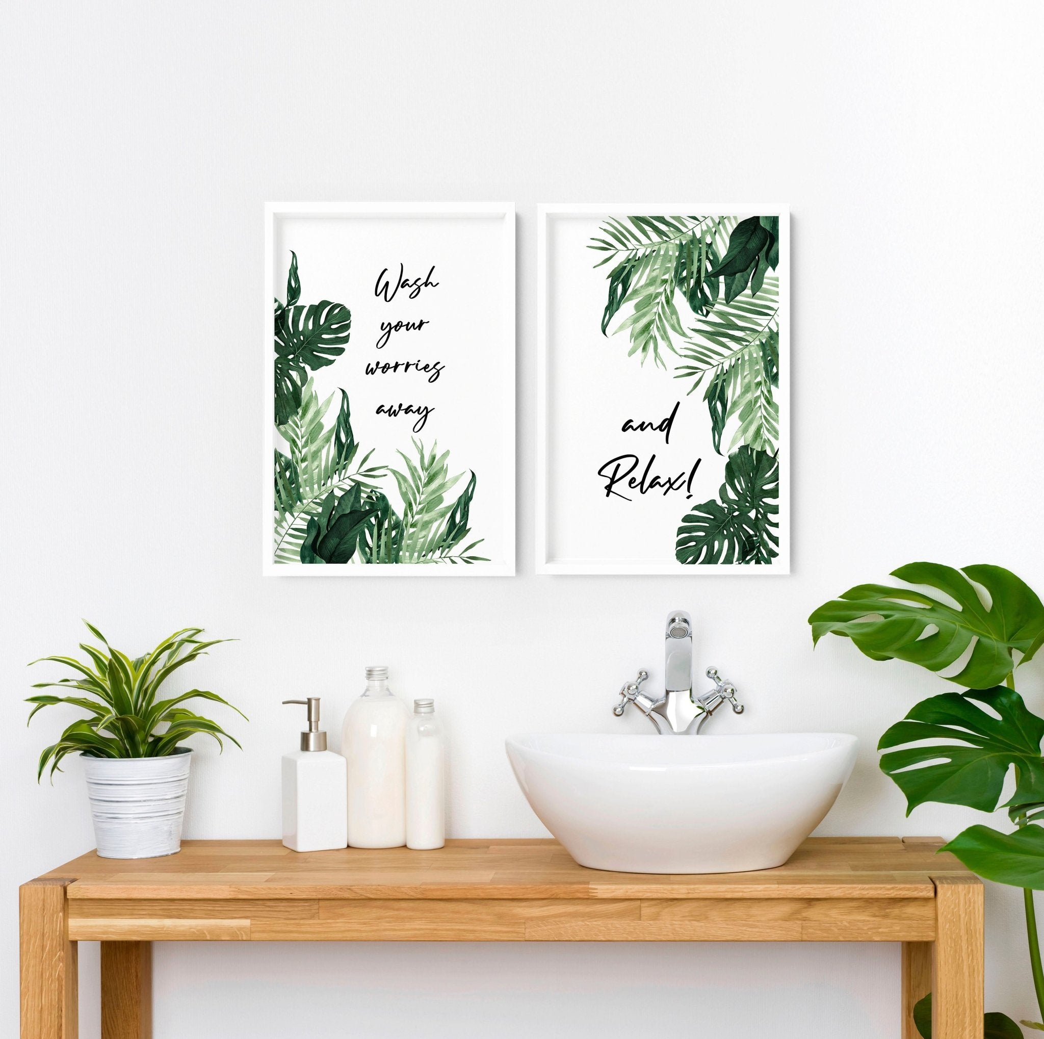 Set of 2 vibrant wall art prints featuring Monstera leaves in watercolour, perfect for bathroom decor.