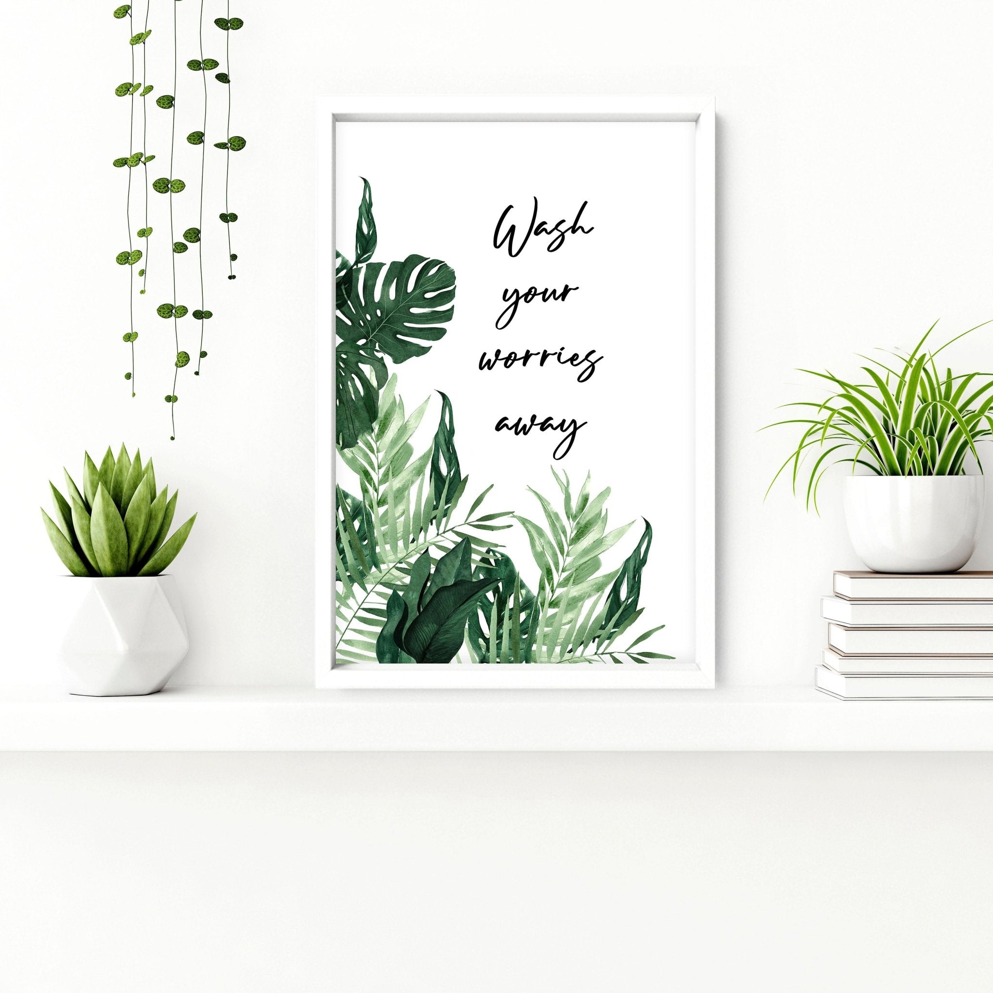 Set of 2 vibrant wall art prints featuring Monstera leaves in watercolour, perfect for bathroom decor.