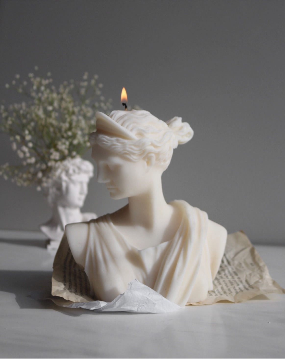 Artemis Greek goddess decorative candle, elegantly designed with a sculptural form, made from a soy wax blend, perfect for home decor.