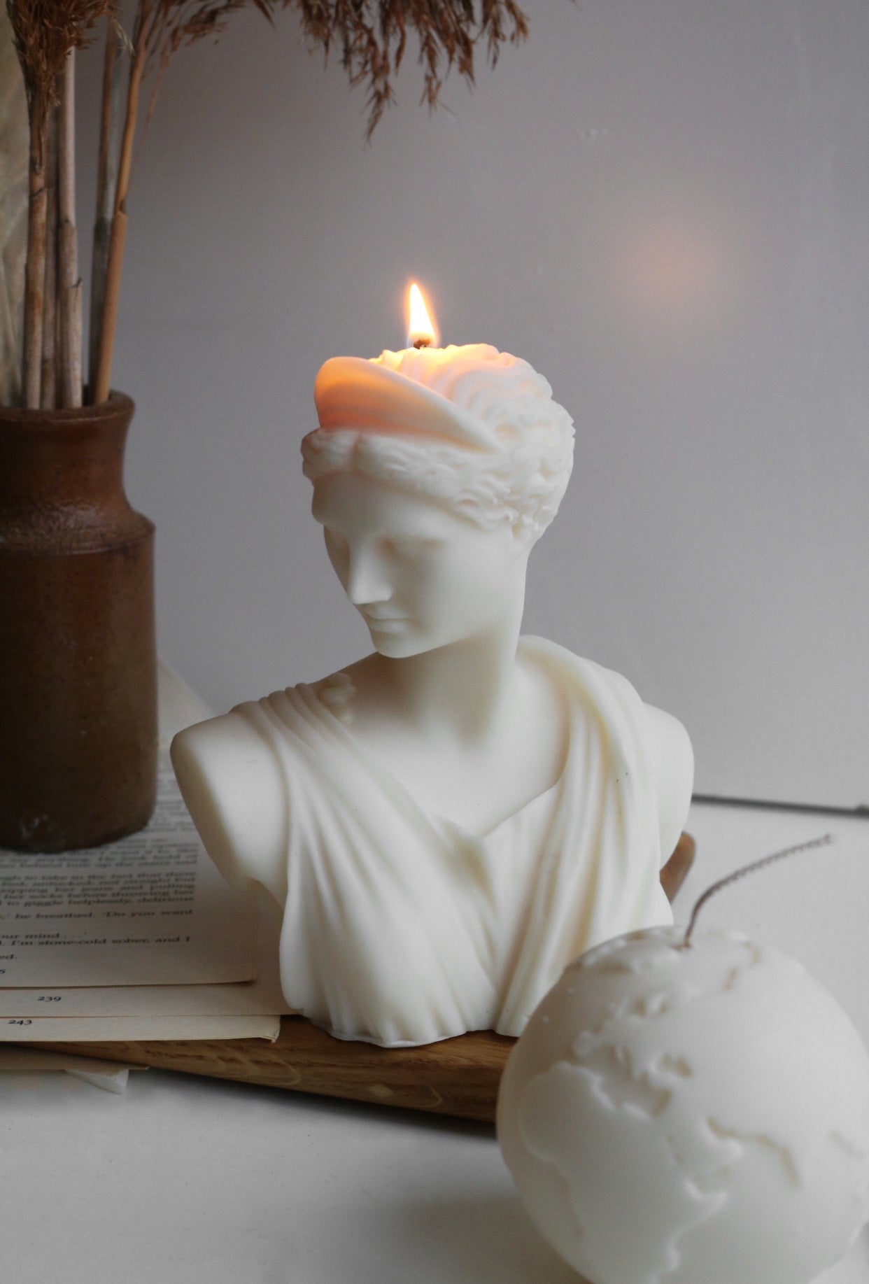 Artemis Greek goddess decorative candle, elegantly designed with a sculptural form, made from a soy wax blend, perfect for home decor.