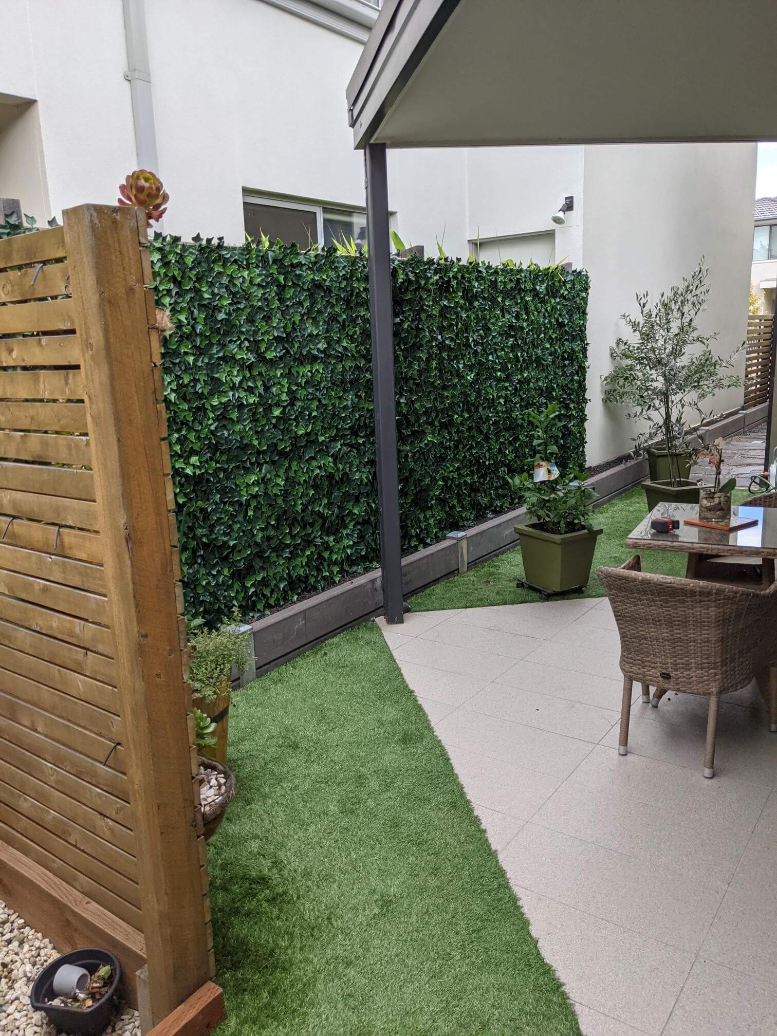 Outdoor patio with artificial grass.