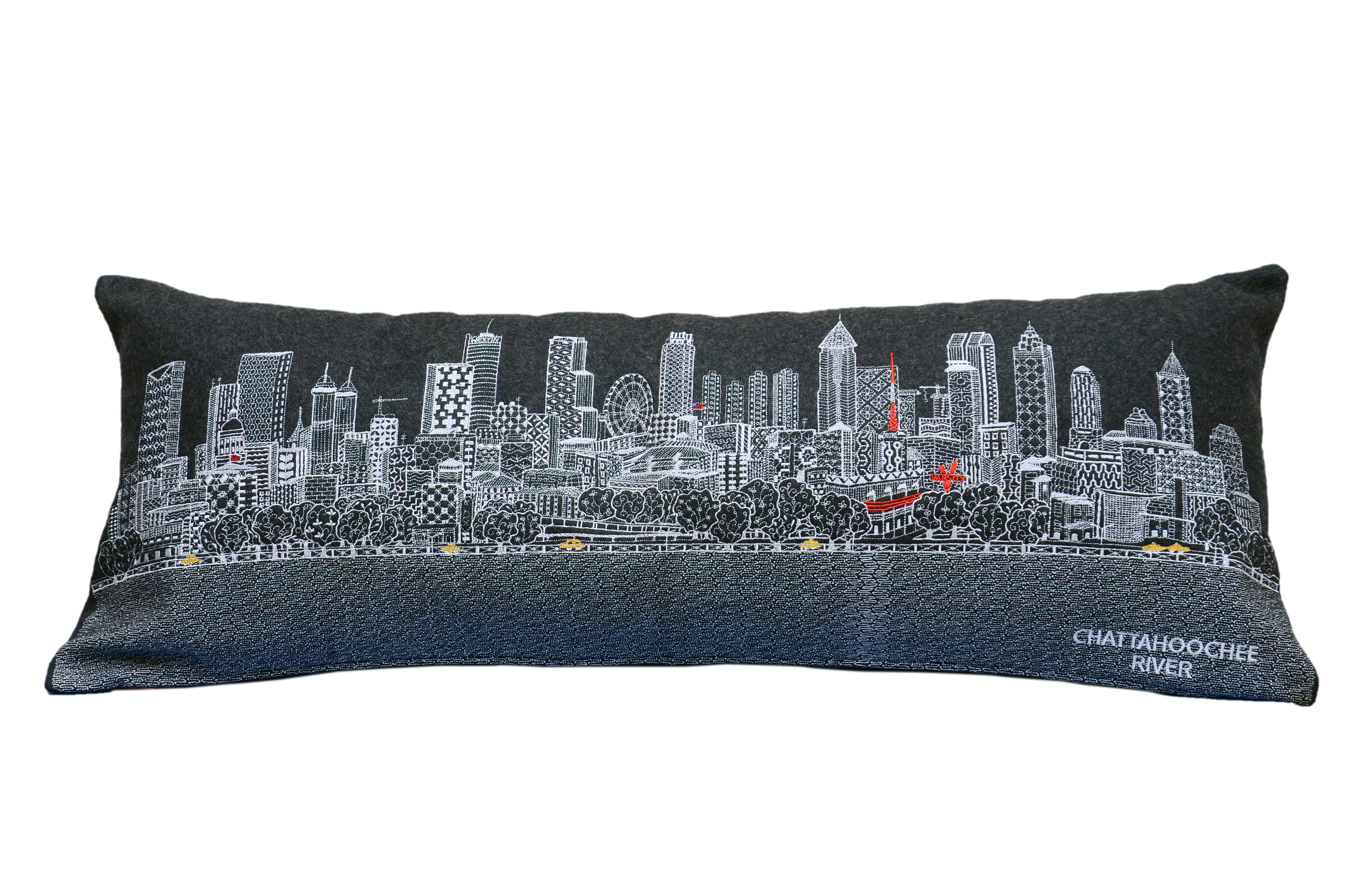 Atlanta Pillow featuring embroidered landmarks of Atlanta, Georgia, with a red zipper at the bottom.