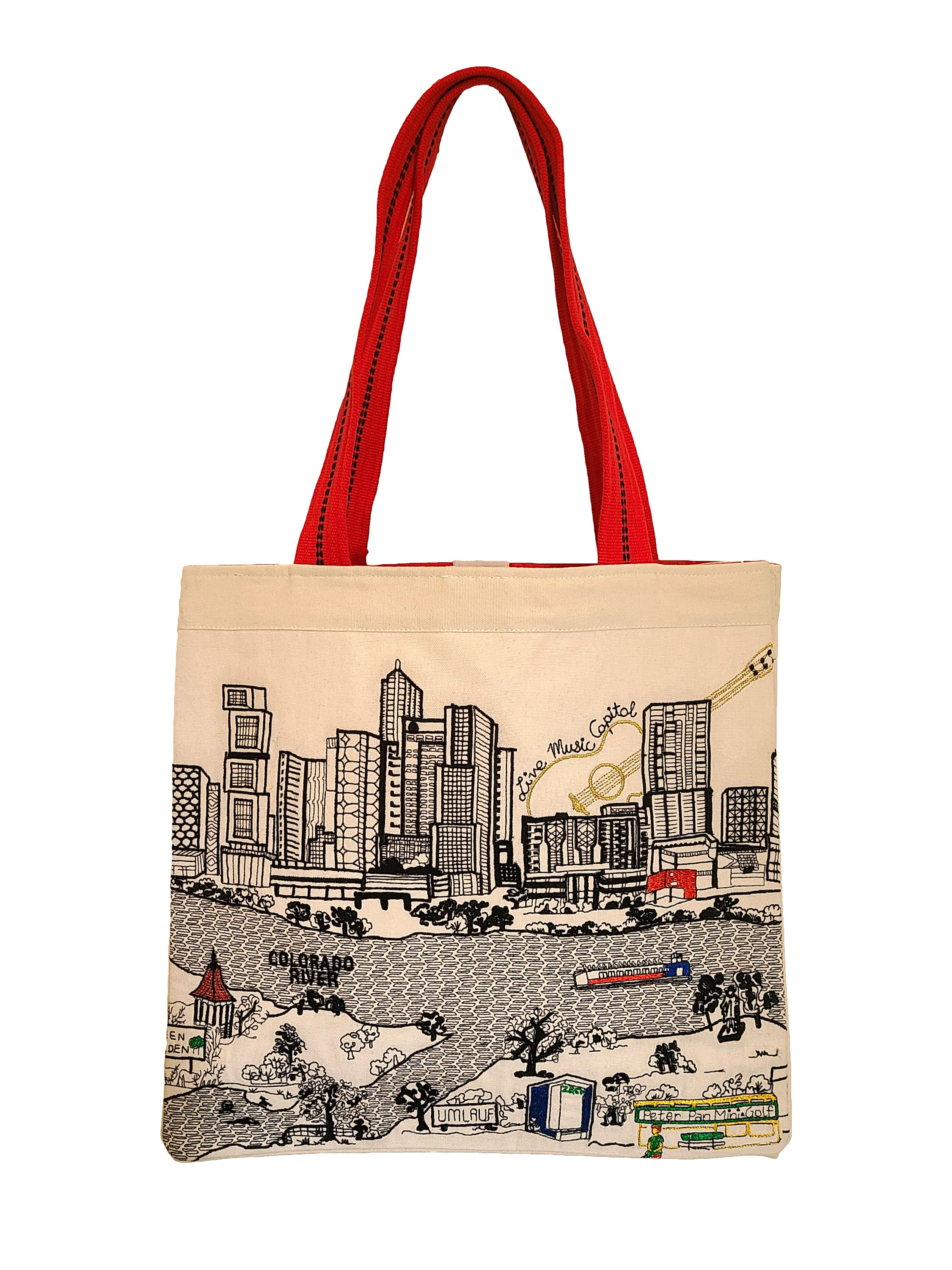 Austin Tote Bag featuring an embroidered skyline design, made of 100% cotton canvas with red waterproof lining and ribbed red straps.